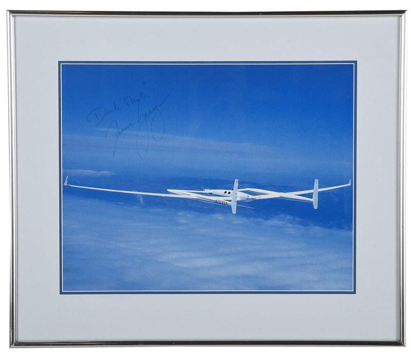 Signed Model 76 Voyager Photo: photograph from circumnavigation flight, signed by pilots Jeana Yeager and Dick Rutan, framed, 22-3/4 x 26-1/2 in. overallÿ - Provenance: Richard Manson, Jr. Collection