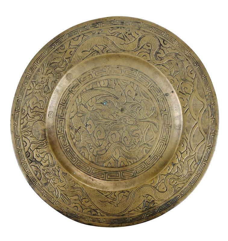 Chinese Bronze Plate with Dragon Decoration: engraved dragon and cloud decoration, geometric borders, underside with possible Xuande reign mark, 10 in. - Provenance: