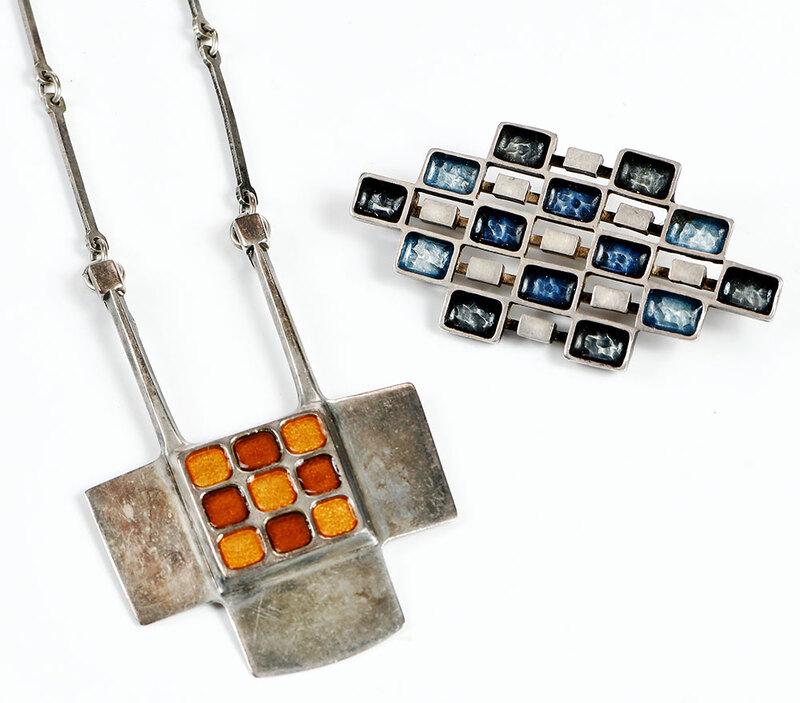 Two Pieces David Andersen Enamel Jewelry: necklace, orange and yellow enamel, stamped "David Andersen, Norway, Sterling 925S, INV.B.S.O", pendant 2-1/2 x 1-3/4 in., chain 24 in. lg., 33.9 grams; brooch, blue enamel, stamped "UNI, D-A- Norway,