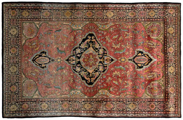 Farahan Sarouk rug,: blue/black central medallion with pendants on pale salmon field, field and corner work with olive green highlights, 4 ft. 3 x 6 ft. 7 in. Even low pile, areas of wear with corduroy effect, ends and si