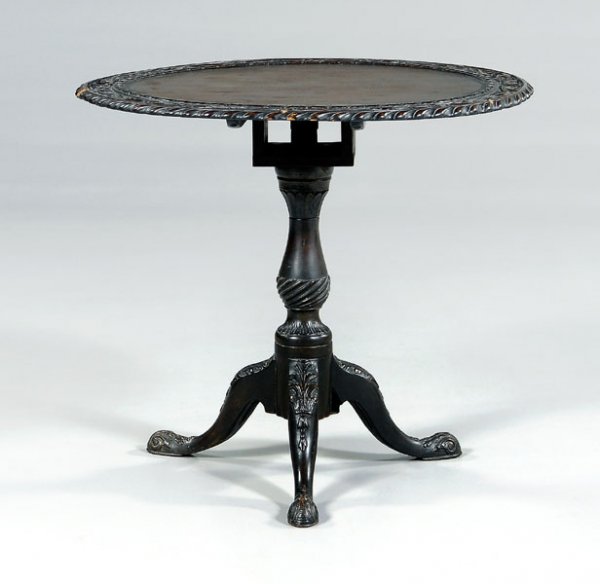 Chippendale tilt-top tea table,: pierce-carved top tilting above spiral-turned baluster support on tripod base with carved knees and feet, original iron spider in place, British, 18th century, closed 27-1/4 x 30-1/2 x 30 in., open 43