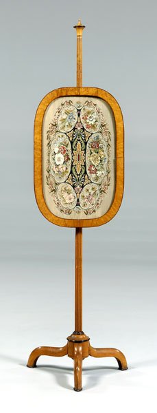 Biedermeier fire screen,: fine needlepoint panel with bird's-eye maple banded frame on tapered reeded column support and tripod base, Continental, 19th century, 65 x 16-1/2 x 16-1/2 in. Cracks and separations to panel frame, s