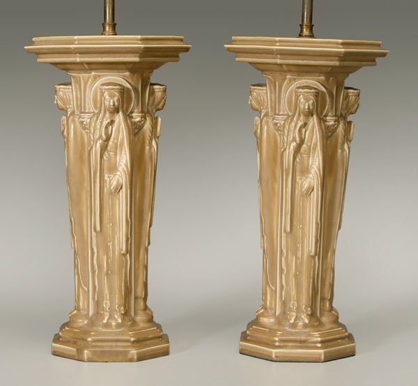 Pair Rookwood lamps:: standing female religious figures, each with rosary and nimbus, runny olive glaze, bases with marks for Rookwood, 1921, number 2475, 15 in., made as lamps. Scattered rim chips, otherwise good conditio