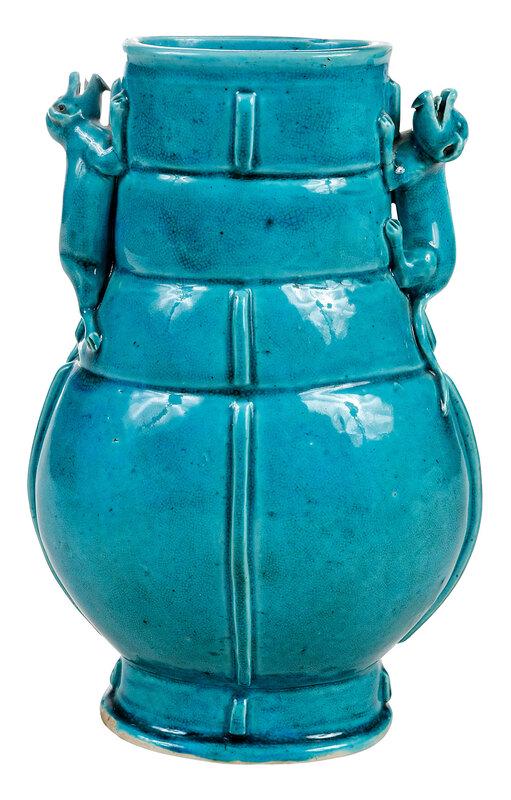 Chinese Turquoise Glazed Archaic Style Hu Vase: probably Kangxi, porcelain hu form vase with splayed foot, two molded figural chilong handles, glazed all over in bright turquoise, 10 x 6-1/2 x 5 in. - Provenance: Estate of the Late J. Alice Maxwell