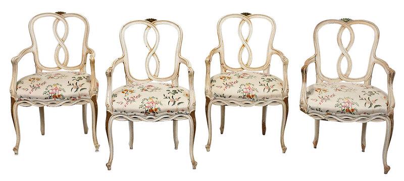 Set of Four Chippendale Style Open Armchairs: 20th century, each with interlaced ribbon backs and seat frames, beechwood frames with white paint and gold highlights, chinoiserie upholstery, 27 x 23-1/2 x 21 in. - Provenance: Estate of Paul W. Dol