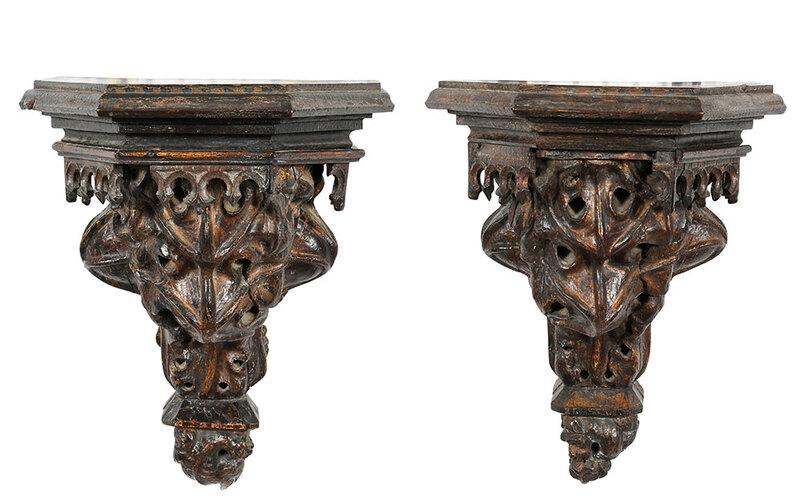 Pair Gothic Style Carved Wood Corbel Shelves: Continental, probably 19th century, heavily carved and pierced acanthus leaf supports terminating in grotesque animal figures including one of a crouched dragon and one of a perched demon, stepped she