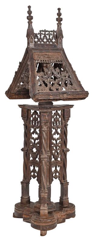 Monumental Gothic Style Carved Walnut Lectern: Italian, 19th century or earlier, two sided adjustable lectern with tall spires and elaborate Gothic tracery panels, adjusting by wooden screw on tracery carved vine, leaf, andÃ¿trefoil base, confor