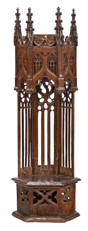 Fine Gothic or Gothic Style Carved Oak Niche: Continental, possibly 16th/17th century, oak throughout, finely crafted, the crown with tall spires and blind carved Gothic arches, resting on a tall pierced Gothic arch support, six sided platform ba