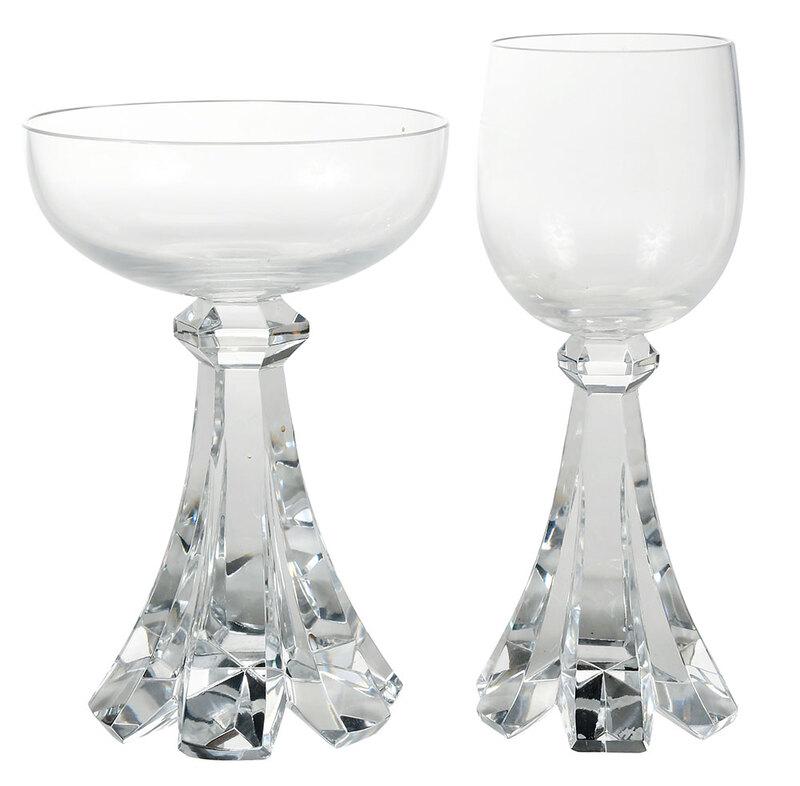 20 Baccarat Wine and Champagne Glasses: French, 20th century, with heavy and cut flared stems,ÿacid etched on base "Baccarat/France", 10 wine glasses, 6-1/8 in.; 10 champagne saucers, 5-3/8 in. - Provenance: Estate of Paul W. Doll, Jr., La