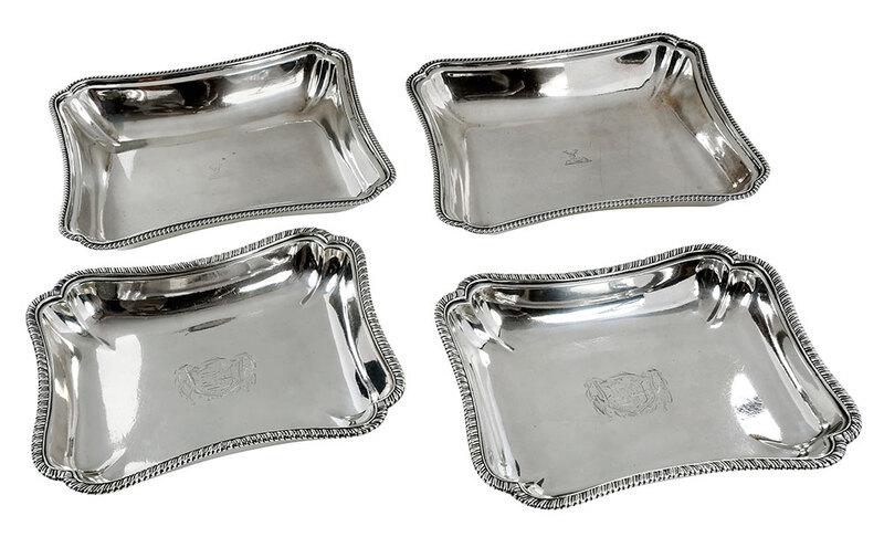Two Pairs of English Silver Liners: London, both with gadroon borders, shaped rectangular forms, heraldic device: smaller set with marks for James Young, 1775; larger with partial marks, probably 1783, .925 fine, 83.10 oz. T., 9-1/4 in.