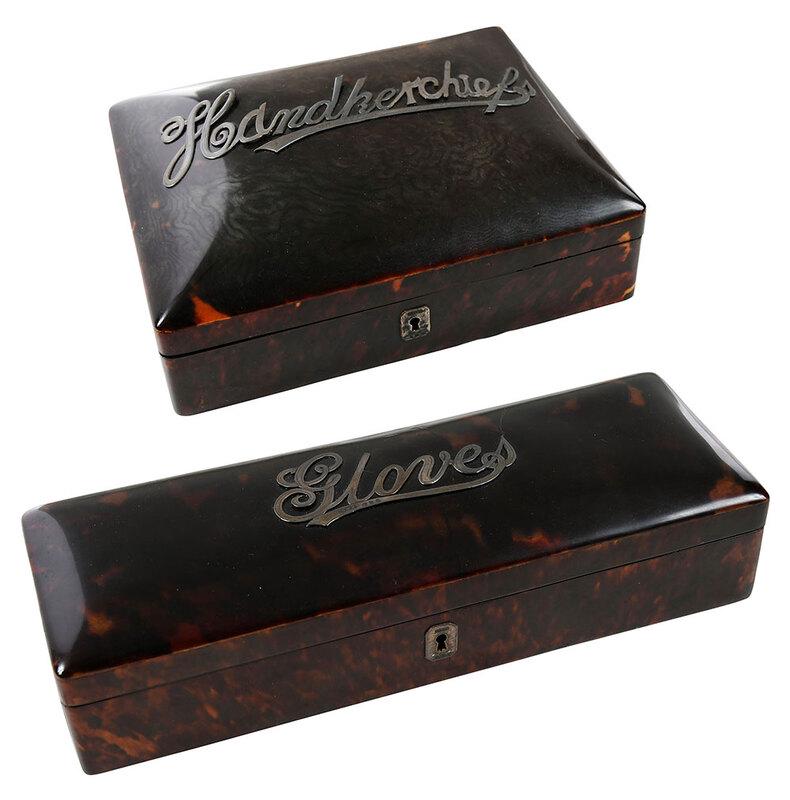 Two English Silver Mounted Faux Tortoise Boxes: Chester, 1896-1897, one square with applied "Handkerchiefs" and one rectangular with applied "Gloves", both locks and English silverÿescutcheon,ÿgreen velvet interior, silver with marks forÿCorneli