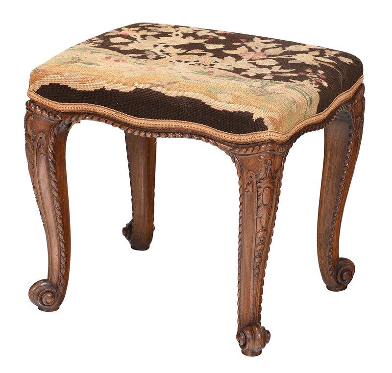 Provincial Louis XV Style Needlework Footstool: French, late 19th/early 20th century, carved mahogany frame with scrolled feet set with needlework upholstery centering a phoenix, 17 x 18-1/2 x 16 in. - Provenance: Collection of Dr. Joseph T. and Ga