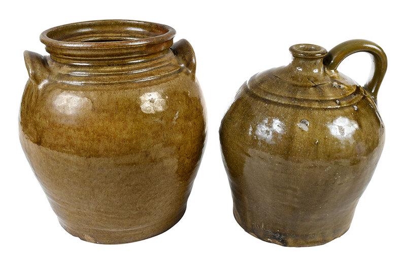 Lewis Miles Attributed Edgefield Stonewares: Stoney Bluff Manufactory, Horse Creek Valley, Edgefield District, South Carolina, mid 19th century, small storage jar with brownish alkaline glaze, two slash marks at shoulder, two ridges to shoulder 