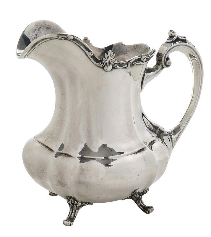 Reed & Barton Hampton Court Sterling Water Pitcher: American, 20th century, oval paneled form, scroll border, no monogram, marks for Reed & Barton, 29.67 oz. T., 9 in. - Provenance: Estate of Paul W. Doll, Jr., Lake Toxaway, North Carolina