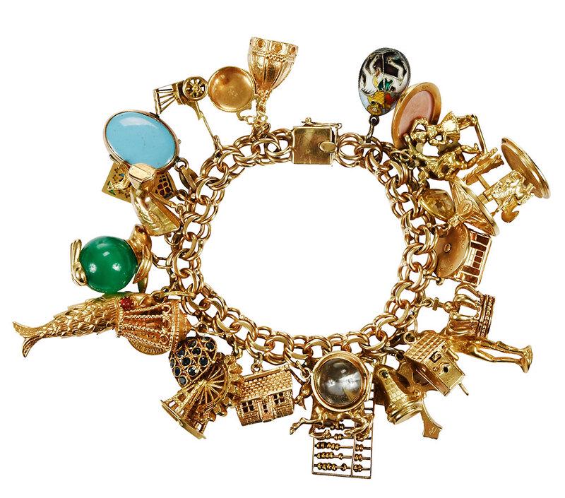 Gold Charm Bracelet: 31 assorted charms, four 10kt., fifteen 14kt., nine 18kt., three non-gold, clasp stamped "14K", yellow gold, 7-1/2 in. lg., 159.1 gramsÿ - Provenance: Private Collection, Atlanta, GA