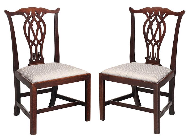 Fine Pair of Chippendale Mahogany Dining Chairs: Charleston, South Carolina or British for the Charleston market, 1760-1775, each with pierced splat, upholstered slip seat and square legs with stretchers, each stamped on back rail "HN" or "NH", seat