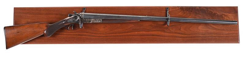 Remington Double Barrel Hammer Shotgun: side by side configuration, 12 gauge, matching serial numbers 215523, barrels 30 in., LOP 13-3/4 in.,ÿ barrel rib engraved "REMINGTON ARMS CO. ILION, N.Y.ÿ U.S.A.", left barrel improved modified, ri