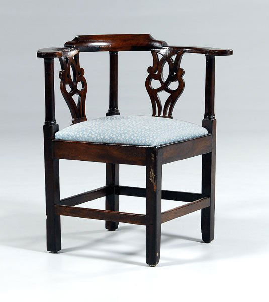 Chippendale mahogany corner chair,: pierced splats and column-form supports, British, 18th century, 31-1/2 x 29-1/4 x 26-1/2 in. Splats repaired and probably associated, patches to arm supports, slip seat replaced, other repairs and res