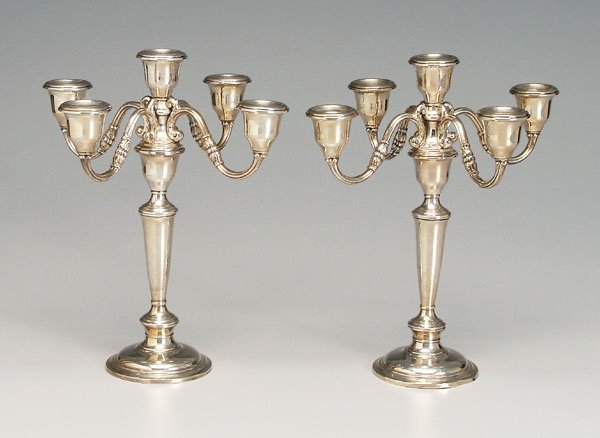 Pair five-cup sterling candelabra:: each in three sections, scroll and foliate arms, marks for Reed & Barton, "H701", weighted, 13 x 11-1/4 in. One base rim dent, one with central section bent, small dents, scratches, some separations. 