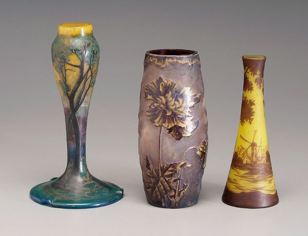 Three cameo glass vases:: lamp base with broad circular foot, tree and foliage on clear and blue ground, marked "Muller Freres Luneville", 10-7/8 in., [good condition;] one tapered amber and gold with windmill, marked "Richard