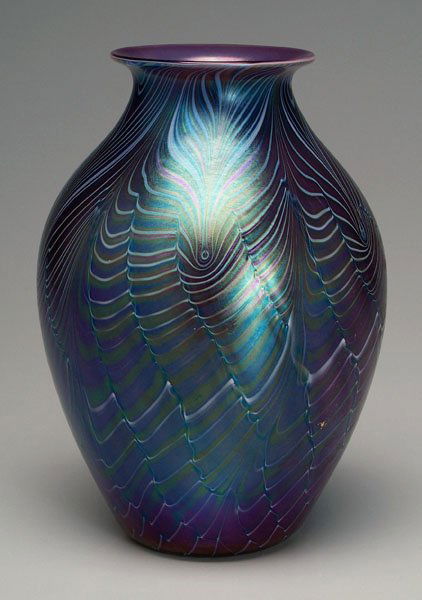 Orient & Flume art glass vase,: purple and iridescent blue with feather decoration, base marked "Orient & Flume 1981", 8-1/2 in. Excellent condition. Provenance: Private Collection, Sarasota, Florida