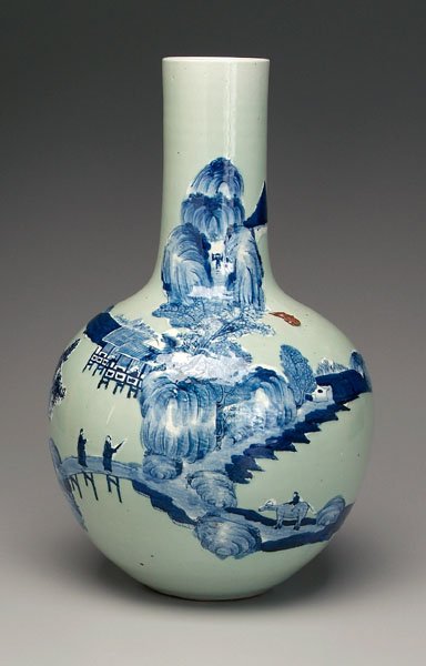 Chinese celadon bottle vase,: blue and white raised decoration, coastal village scene, mountains in distance, export seal on shoulder, 20th century, 20 in. Chip to foot ring, base with glaze cracks, minor wear.