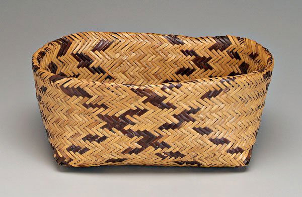 Cherokee river cane basket,: bands of dark brown decoration, double woven, 6-3/4 x 17 x 15-1/4 in. Generally good condition, rim with several small breaks, base with several broken weavers and some corner loss, normal wear. Prove