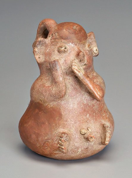 Nayarit earthenware pig vessel,: seated male effigy figure with pig ears, opening on handle, Western Mexico, 100 B.C.-300 A.D., 7 in. Repair to top of head, large chips and breaks to penis and feet, lacking one hand, old surface with
