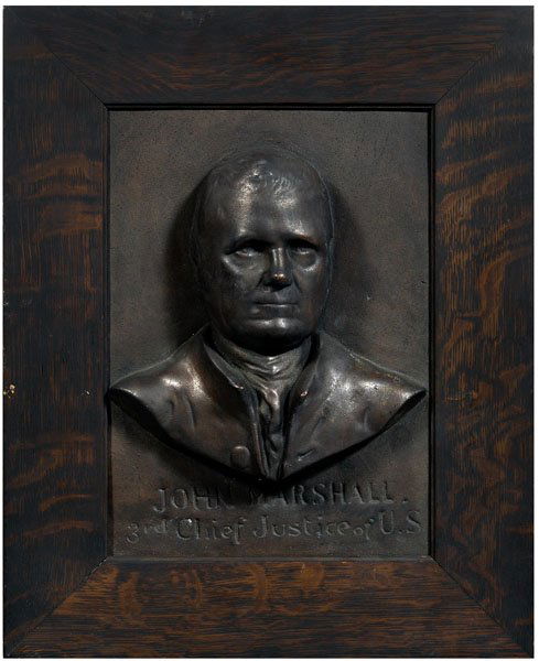 Relief plaque, Justice John Marshall: (1735-1835), high relief bronzed plaster bust on wood panel, inscribed at bottom "John Marshall 3rd Chief Justice of U.S.", unsigned, circa 1880 by unknown artist (costume) and after the quarter bust