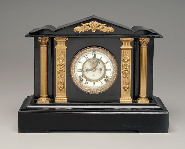 Ansonia shelf clock,: architectural format, open escapement above Ansonia mark, key wind, polished black slate base, with key and pendulum, 12-1/4 x 16 x 6-3/4 in. Columns with later gold paint, minor surface chips and los
