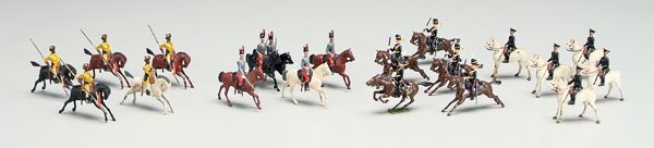 Three sets Britains toy soldiers:: set No. 175, five Austro-Hungarian Lancers, yellow uniforms, one trumpeter, four with lances, [generally good condition, some with scattered paint chips;] five galloping Hussars with red plumes, [good