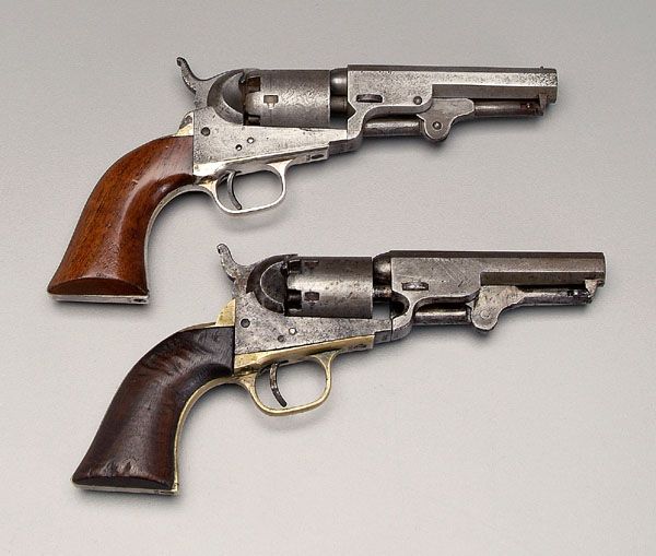 Two Colt pocket revolvers,: both Model 1849, .31 cal., 4 in. barrels: one serial number 324663, metal parts with salt and pepper finish, old cleaning, grips with gouges and losses, possibly 10 percent original surface; one seria