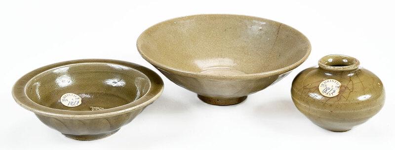 Three Longquan Style Celadon Items: Chinese, possibly Yuan dynasty, one twin fish bowl, exterior with petal design, 1-3/4 in x 5 in.; small vase with unglazed base, 2-1/2 x 3 in.; shallow bowl with ribbed exterior, 2-1/4 x 6-3/8 in. - P
