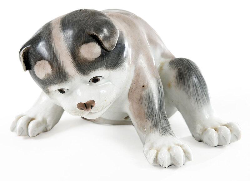 Japanese Porcelain Figure of a Puppy: Meiji period, seated form paint decorated with gray and brown overglazes, 3 x 5-3/4 in.