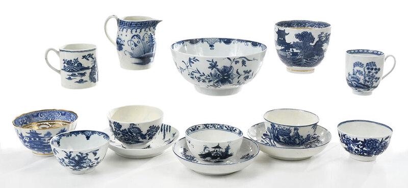 14 Pieces of Blue and White Worcester: English, probably 18th/ 19th century, all with blue and white paint or transfer decoration, many with chinoiserie scenes, including a creamer; two handled cups; sugar bowl; six tea bowls; three saucer