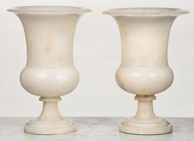 Pair of Alabaster Urns Mounted as Lamps: Continental, 20th century, on circular bases, wired for electricity, bases with later felt covering, 13-3/4 x 9-1/2 in. - Provenance: Private Collection, Charlottesville, Virginia