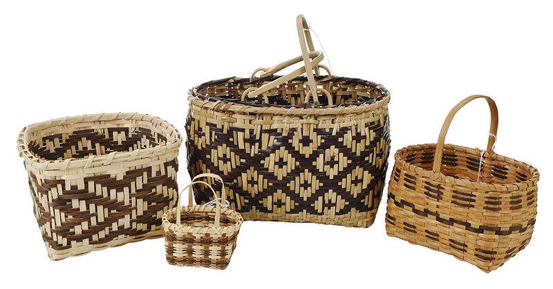 Four Janell Panther Cherokee Baskets: Qualla Boundary, North Carolina, circa 2011, one rivercane market basket with carved wood swing handles, three oak split baskets with brown and tan dyes, two signed "Janell Panther/Cherokee/NC/2011", 