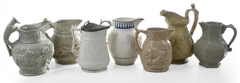 Seven Relief Molded Pitchers: British, early to mid 19th century, comprising three Mason's Ironstone including two with hunt scenes and one with delicate vine and bird decoration, largest stamped "TOHO" and other two, "Mason's Pat