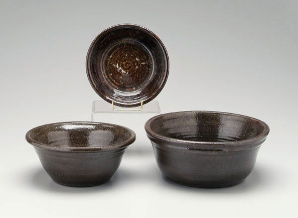 Three Meaders bowls,: all alkaline glaze: one with shaped rim, signed in script on bottom "Lanier Meaders" (1917-1998, White County, Georgia), 5-7/8 x 13-5/8 in., [excellent condition, possibly unused;] one with rolled and