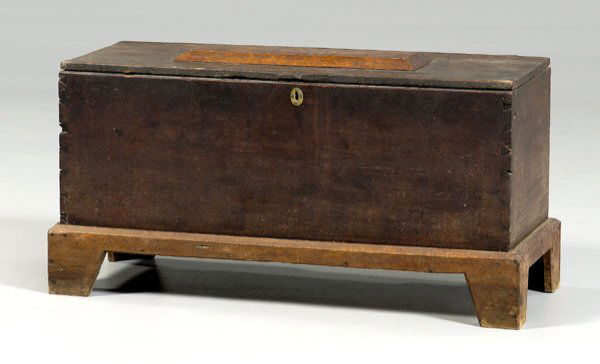 North Carolina Chippendale blanket: chest, walnut with hinged top and open interior, dovetailed case on later bracket feet, attributed to Macon County, North Carolina, late 18th/early 19th century, 19-1/2 x 39-1/2 x 17 in. Feet and base