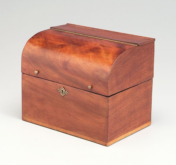 Mahogany spirits case,: lift top opening to fitted interior, base possibly chestnut, 9 x 11 x 7 in., [escutcheon has been remounted, probably refinished, old relining, base with replaced fabric;] with six gilt-decorated bott