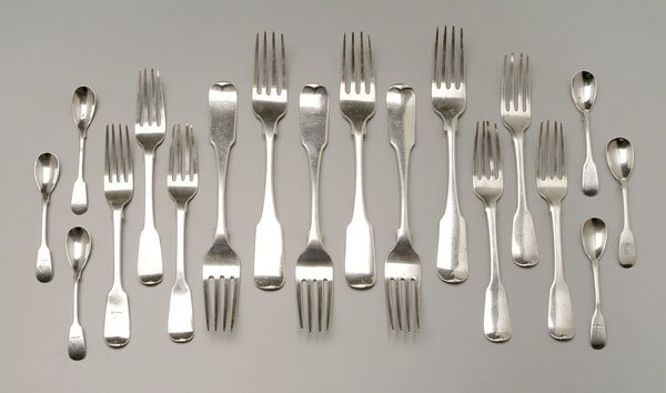 English and Irish silver flatware:: fiddle handles, forks, spoons with egg-shaped bowls, some with heraldic devices, .925 fine, 22.68 oz.T., (18 pieces); detailed listing available.