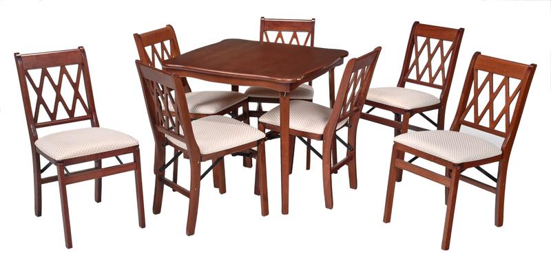 Mahogany Folding Card Table, Seven Folding Chairs: modern, table with shaped square top and tapered legs, 29-1/4 x 32 x 32 in.; each folding chair with mahogany frame and upholstered seat, 33 in., seat height 19 in. - Provenance: Private Collection, C