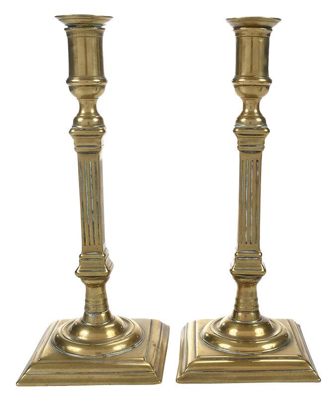 Pair of George III Brass Candlesticks: British, late 18th century, sockets with original loose bobeches, square fluted column form shafts on square stepped bases, 11 x 4-1/2 x 4-1/2 in. - Note: A similar candlestick example can be seen in