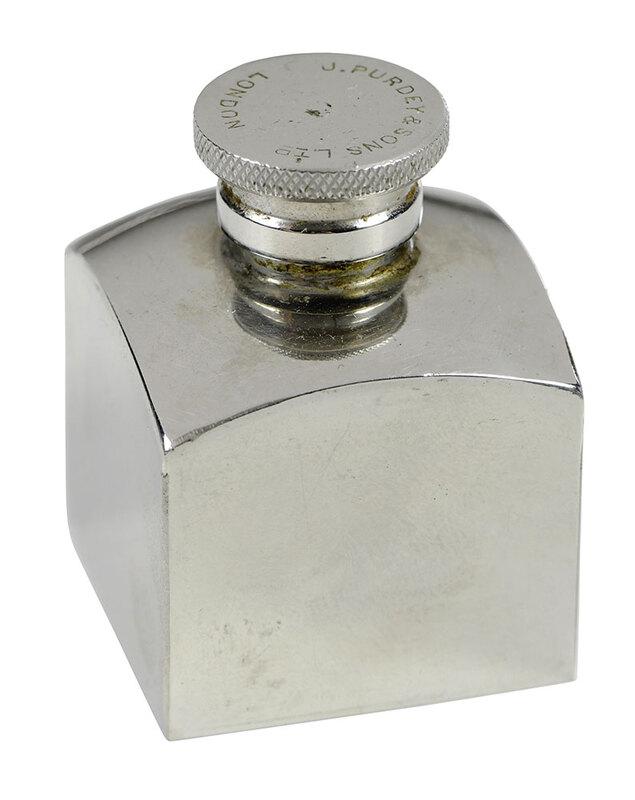 J. Purdey and Sons Gun Oil Bottle: square nickel design, with cap and feather, marked at screw cap "J. Purdey and Sons LTD/London", at base "Made in England", originally packaged with 20 gauge shotgun, 2 x 1-1/2 in. - Provenance: Pri