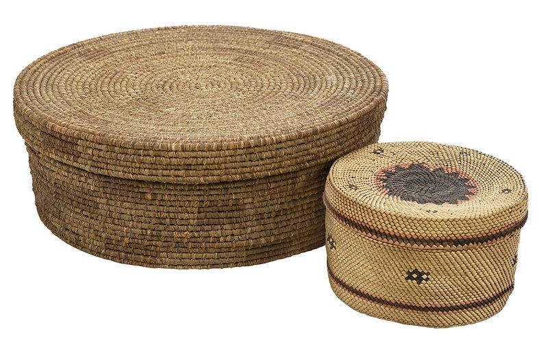 Two Native American Covered Baskets: probably Northwest Coast, 20th century, finely woven small basket with red and brown geometric decoration, 2-1/2 x 4 in.; round coiled basket, 3 x 8-1/2 in. - Provenance: Private Collection, North Car