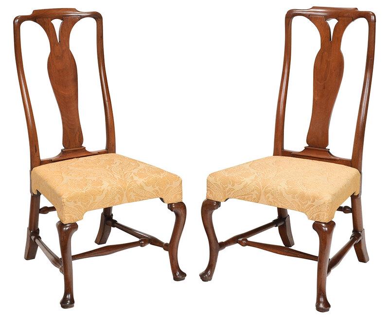 Pair of Queen Anne Walnut Side Chairs: British, early 18th century, each with shaped crest and pierced vase form splat, cabriole legs with turned stretchers, 42 in., seat height 18 in. - Provenance: Private Collection, Columbus, North Caro