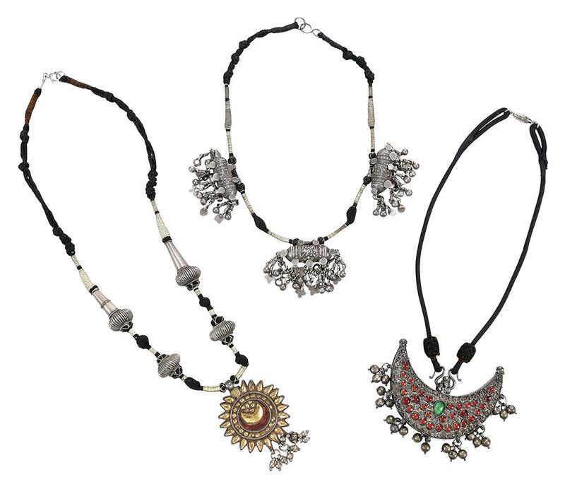 Three Middle Eastern Style Necklaces: glass "stones", center medallion of each tested at least .800 silver, center medallions range from approx. 1-3/4 x 1-3/4 to 3 x 3-1/2 in., 16 to 21-1/3 in. lg., 149.5 grams - Provenance: Proceeds to B
