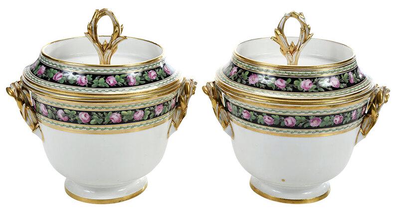 Pair of Hand Painted Porcelain Fruit Coolers: British or French, 19th century, each with bowl insert and dished lid, molded leafy handles, hand painted with a band of roses on black ground, gilt accents, one with gilt mark to base, one with iron 