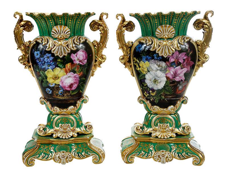 Pair Jacob Petit Green Ground Porcelain Vases: French, 19th century, each with cartouche reserve of finely painted flower arrangements, gilt molded rocaille handles, leaf and shell borders, mounted on a two part stepped base, with old labels for J